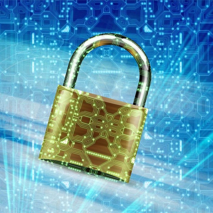 Padlock on a blue technology background.