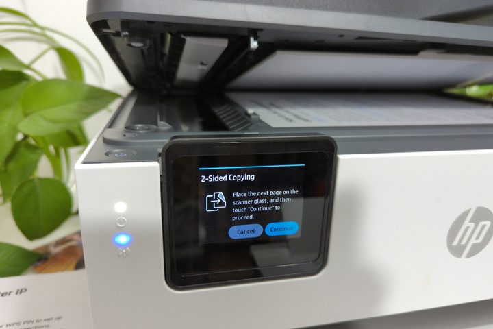 The OfficeJet Pro 8135e doesn't have automatic duplex, but you can flip pages manually.