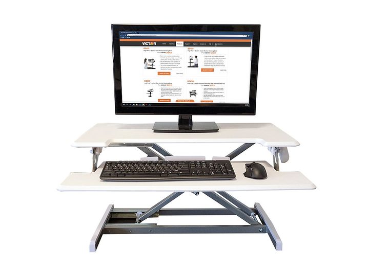 The Victor compact adjustable standing desk against a white background.