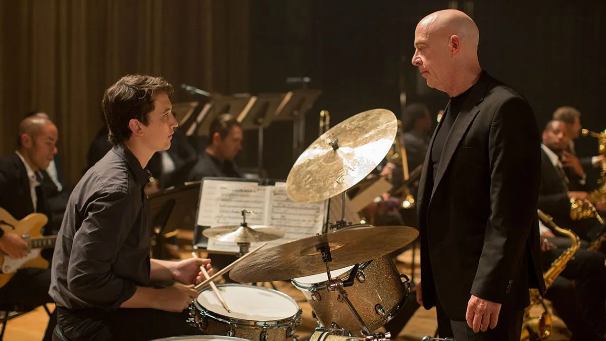 Miles Teller and J. K. Simmons in Whiplash.