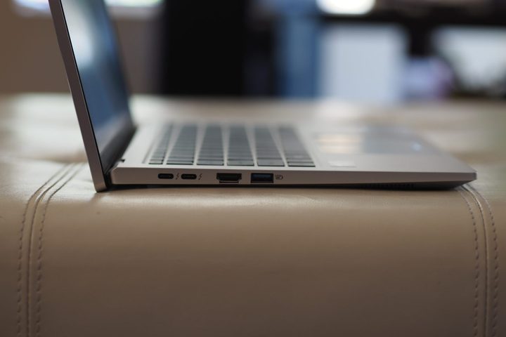 Acer Swift Go 14 side view showing lid and ports.