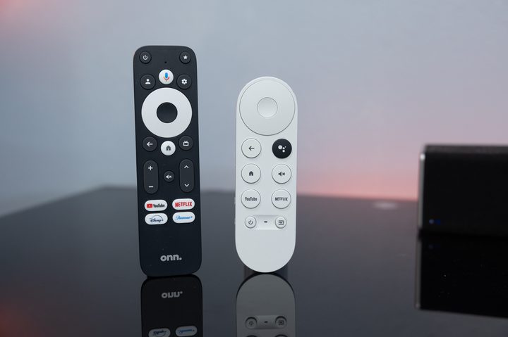 The Onn 4K Pro remote next to the Google Chromecast remote.