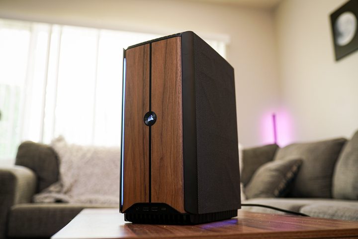 The Corsair One i500 sitting on a coffee table.