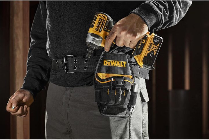 A man wearing the DeWalt Impact Holster.