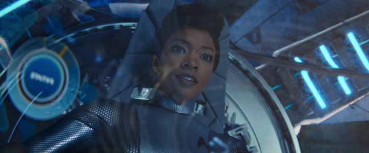 Sonequa Martin-Green as Michael Burnham flying a pod in the Discovery episode "Brother."