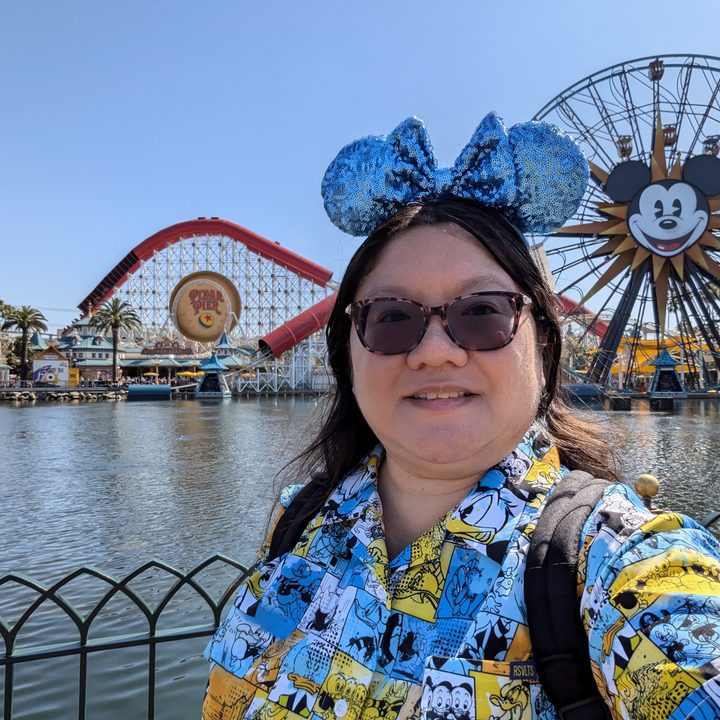 Selfie at DCA Pixar Pier taken with Google Pixel 8a.