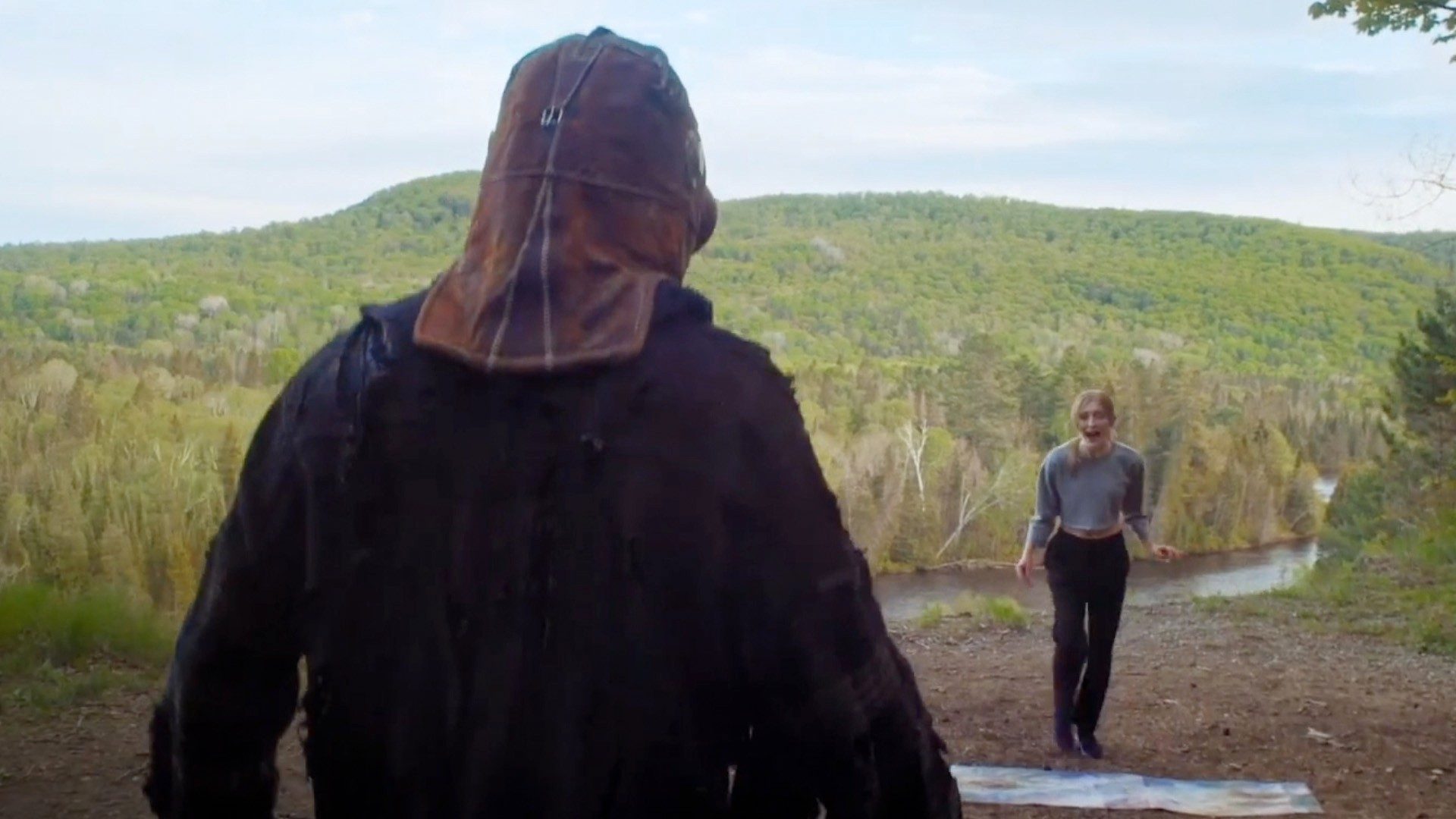 A woman screams a killer approaches in In a Violent Nature.
