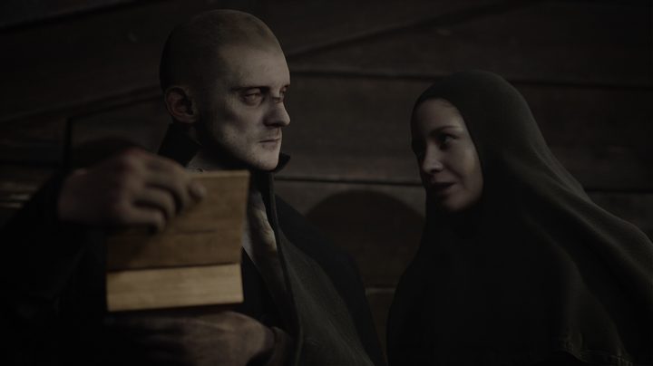 A nun speaks to a man in Indika.