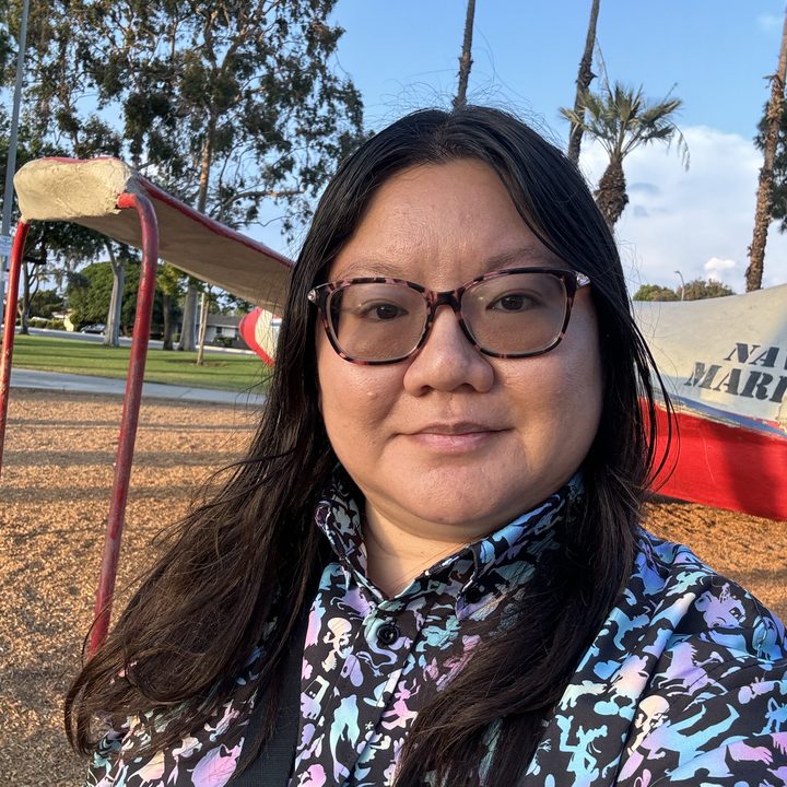 Selfie at park taken with iPhone 15 Pro.