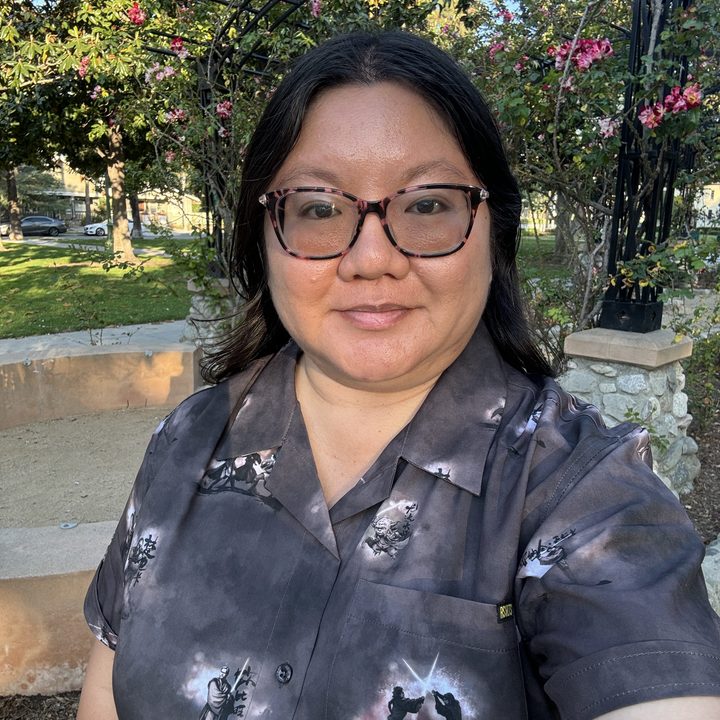 Selfie at rose garden taken with iPhone 15 Pro.