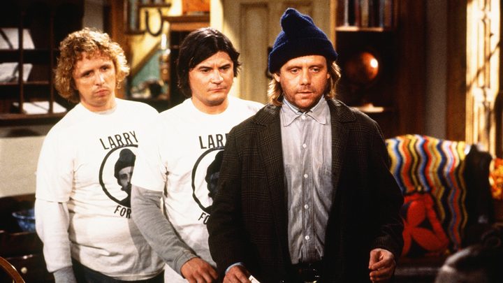 Larry, Darryl, and Darryl from Newhart standing in a row.