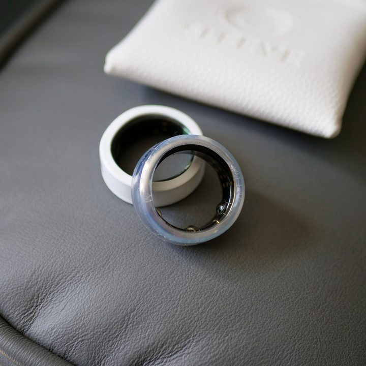 Two OSleeve covers with a pouch and two Oura Rings.