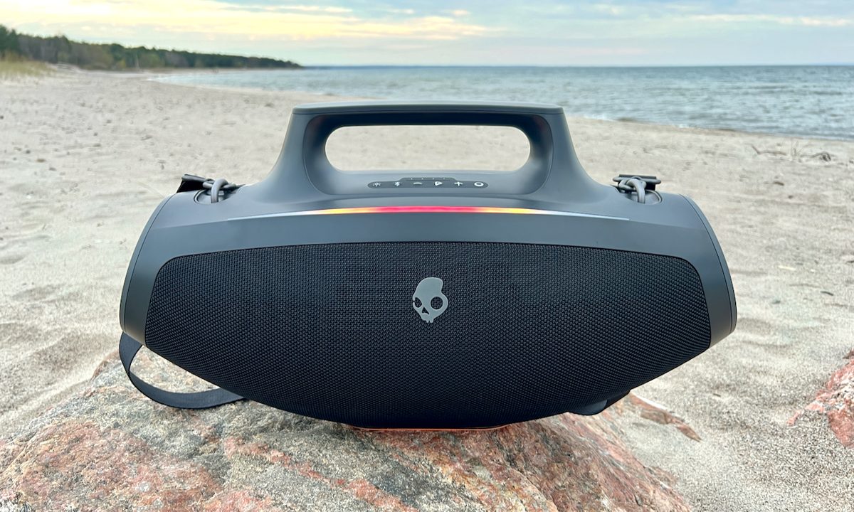 The Skullcandy Barrel Bluetooth speaker on a rock.
