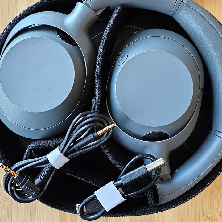 Sony ULT Wear and accessories inside travel case.