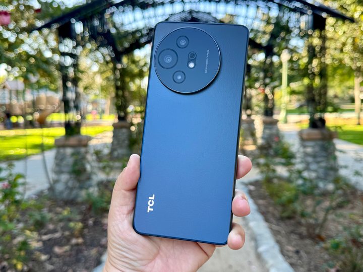 TCL 50 XL 5G in hand.