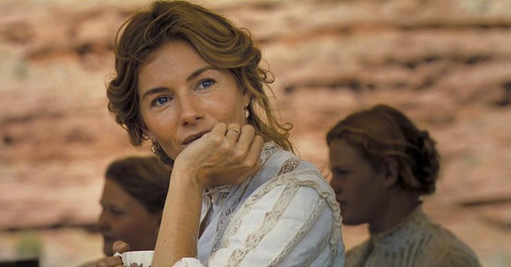 A woman looks over in Horizon: An American Saga.