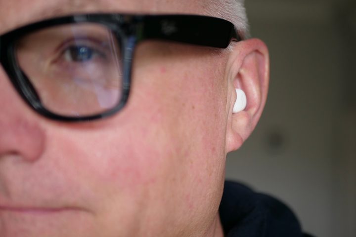 A person wearing the 1More Z30 Sleeping Earbuds.