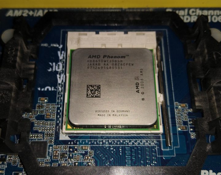 The Intel Phenom X3 socketed in a motherboard.