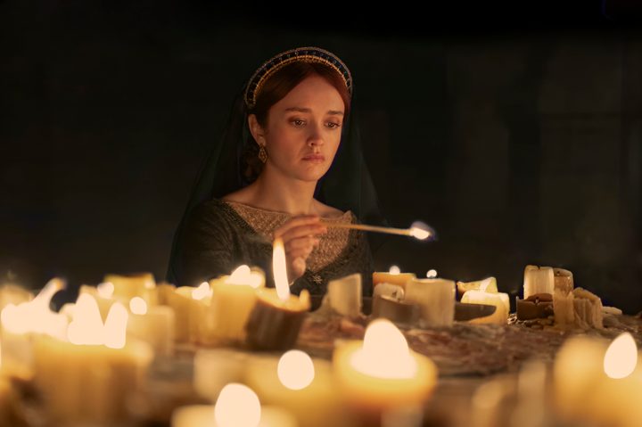 Alicent Hightower lights prayer candles in House of the Dragon Season 2.