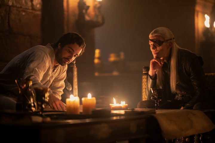 Criston Cole and Aemond Targaryen sit together in House of the Dragon season 2.