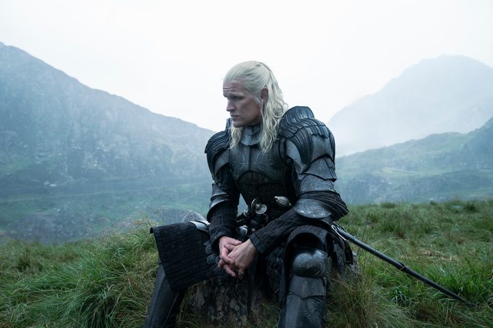 Daemon Targaryen sits in a field alone in House of the Dragon season 2.