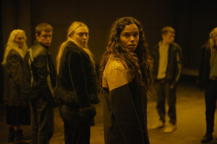 Georgina Campbell looks to the side in fear in The Watchers.
