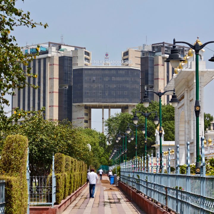 Large office building joined by a bridge in New Delhi, India clicked using Vivo X Fold 3 Pro with Zeiss cameras.
