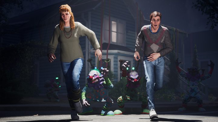 A couple runs away from alien clowns in Killer Klowns from Outer Space.