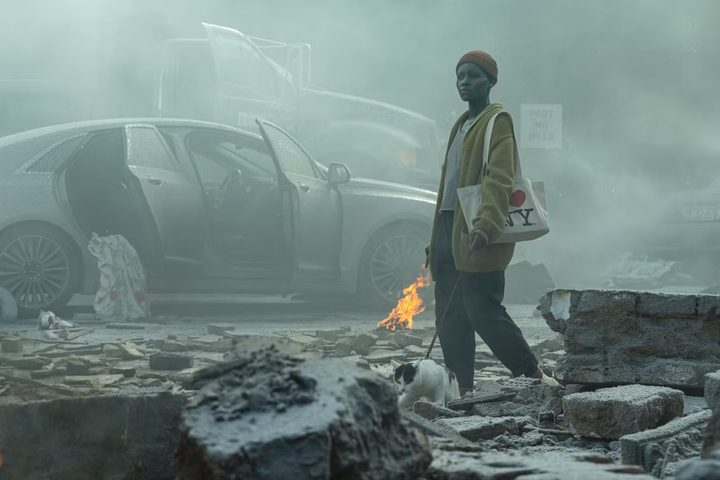 Lupita Nyong'o walks through rubble in A Quiet Place: Day One.