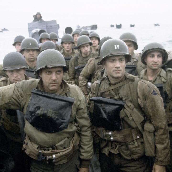 Tom Hanks (center right) and the ensemble of Saving Private Ryan.