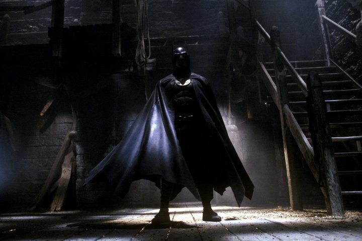 Michael Keaton poses in his batsuit in Batman.