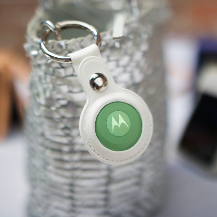 The Moto Tag attached to a purse.
