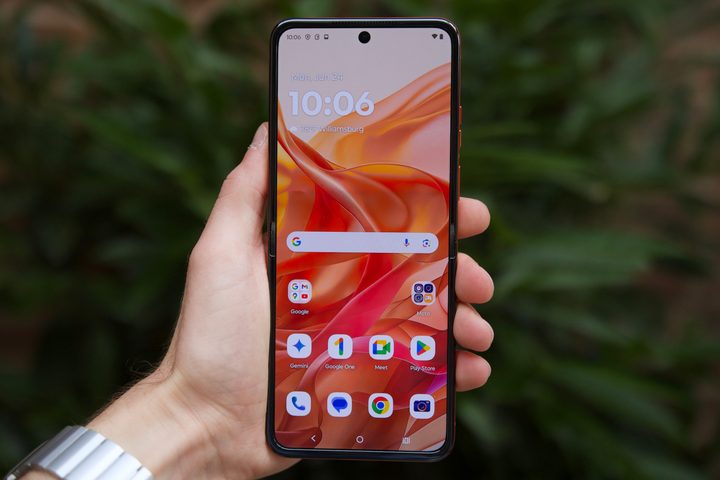 Someone holding the Motorola Razr 2024.