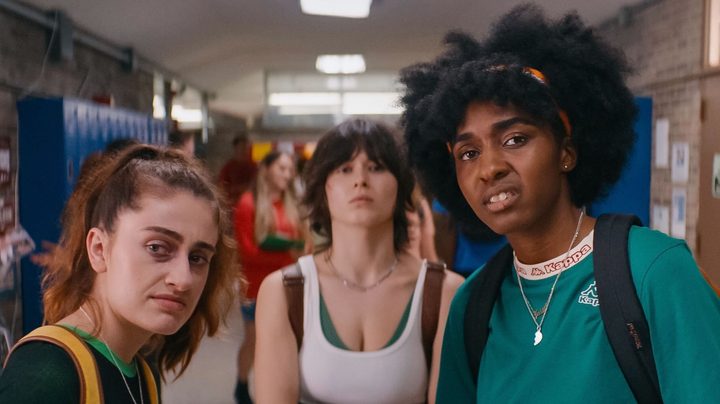 PJ, Josie, and another girl looking directly at the camera with confused expressions in Bottoms.