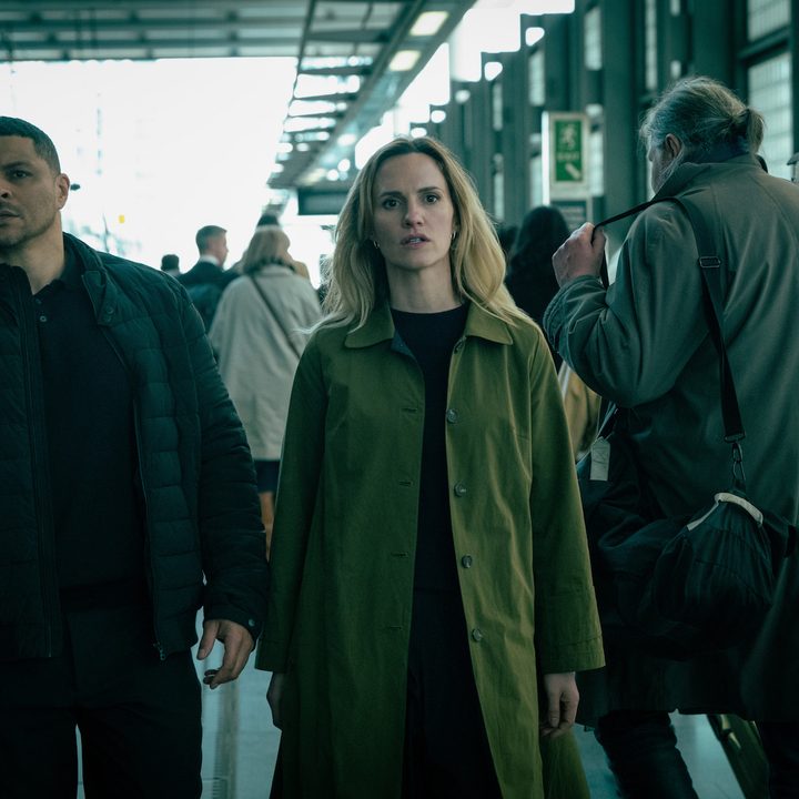A man and woman stand next to each other and walks.