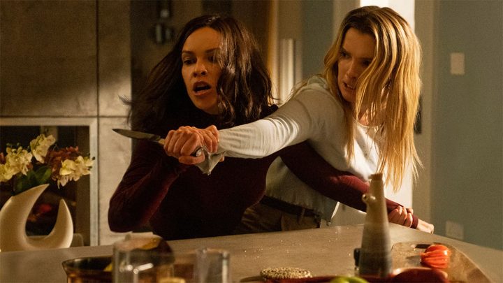 Hilary Swank and Betty Gilpin in The Hunt.