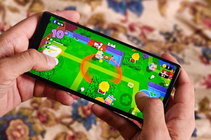 Sqaud Busters Android game on Vivo X Fold 3 Pro held in hand.