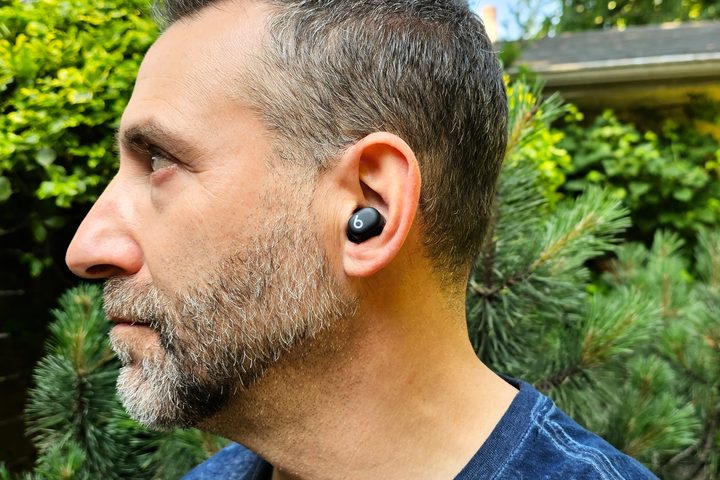 Simon Cohen wearing Beats Solo Buds.