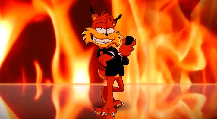 Bubsy, an orange cat, standing in a tuxedo like he's James Bond in GoldenEye 007 holding a remote control.