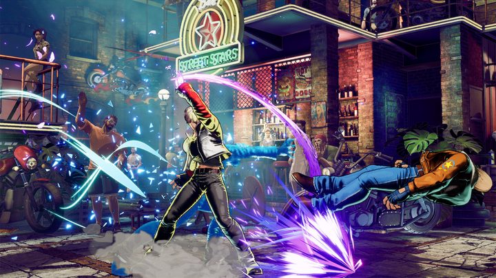 A character punches another to the ground in Fatal Fury: City of the Wolves.