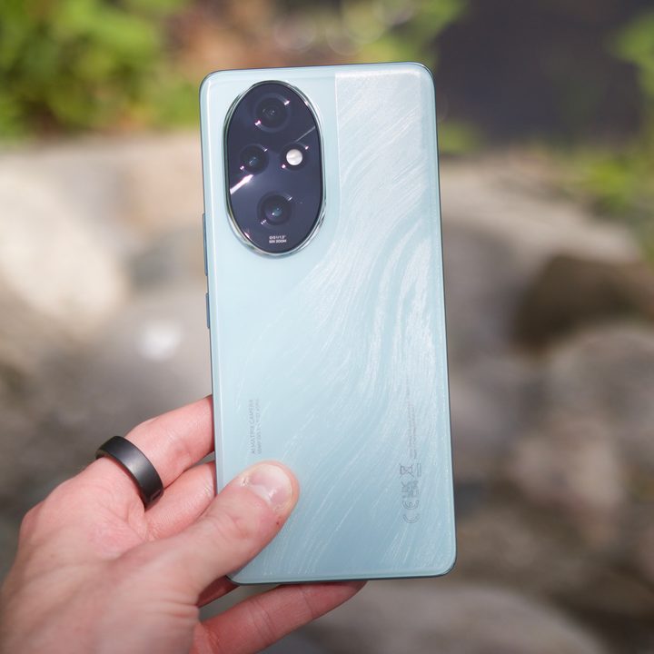 Someone holding the Honor 200 Pro, showing the back of the phone.