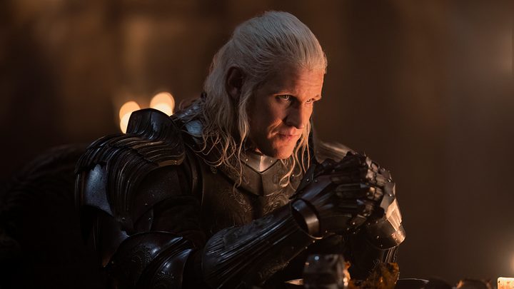 Matt Smith in House of the Dragon in a dark photo looking menacing.