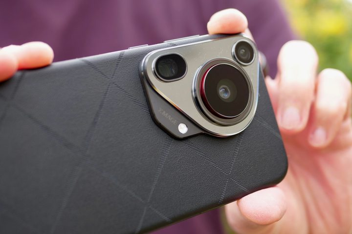 A person taking a photo with the Huawei Pura 70 Ultra.