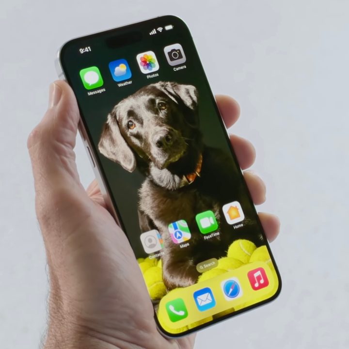 An iPhone home screen with iOS 18.