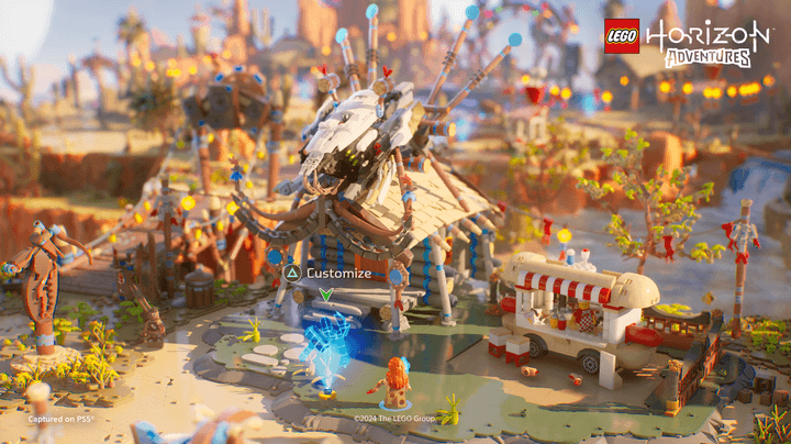 Aloy builds a town in Lego Horizon Adventures.