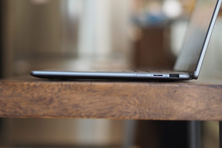 Lenovo Yoga 7 14 Gen 9 side view showing ports and display.