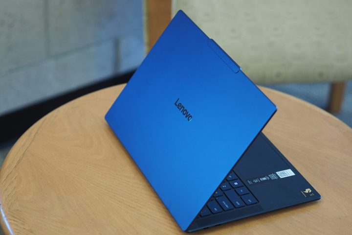 Lenovo Yoga Slim 7x rear view showing lid and logo.
