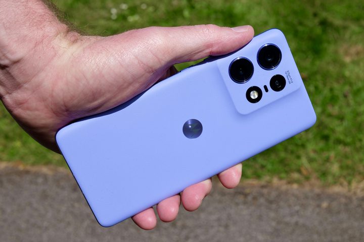 A person holding the Motorola Edge 50 Pro.