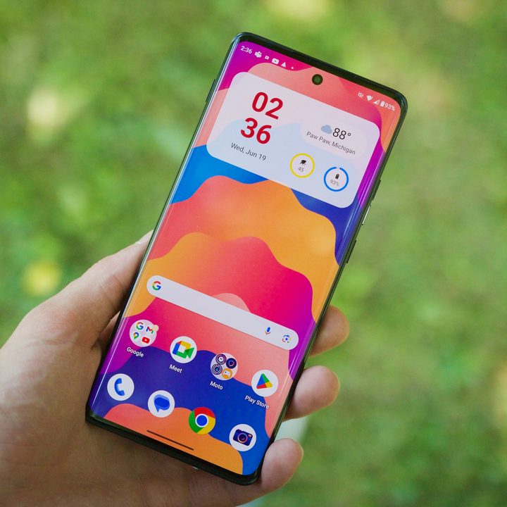 Someone holding a Motorola Edge 2024 with the display on.