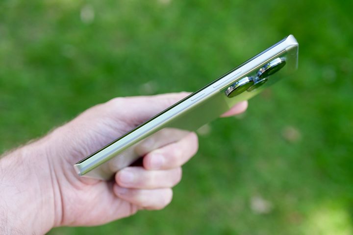 A person holding the Realme GT 6.